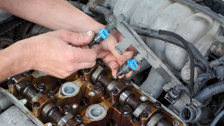 9 Symptoms of a Bad Fuel Injector (and Cleaning/Replacement Cost)