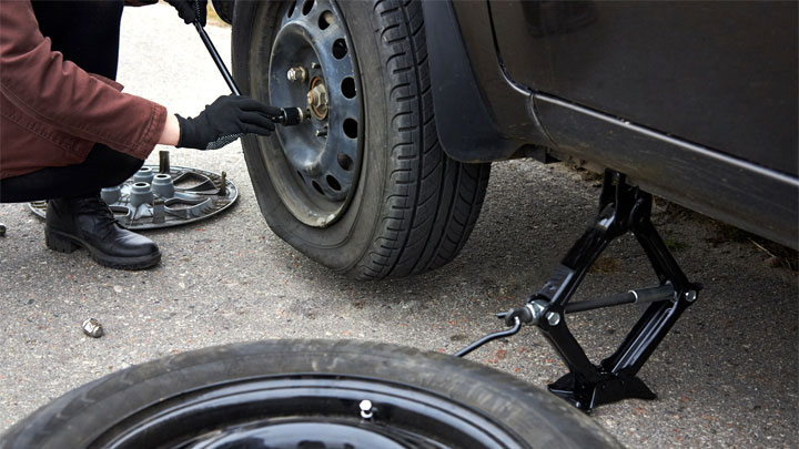 changing a flat tire