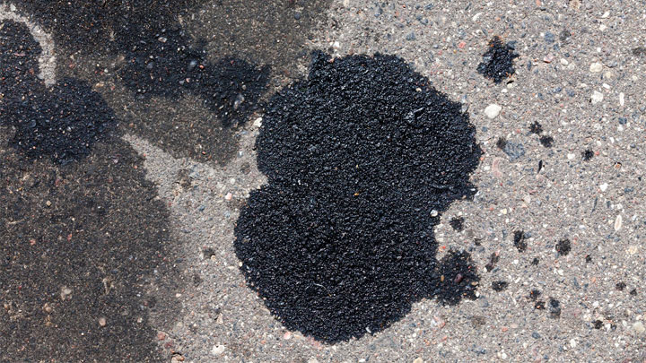 oil puddle on driveway